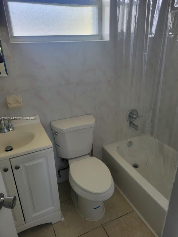 751 Northwest 96th Street Miami, FL 33150 - Photo 12 of 12 a white toilet sitting next to a bath tub