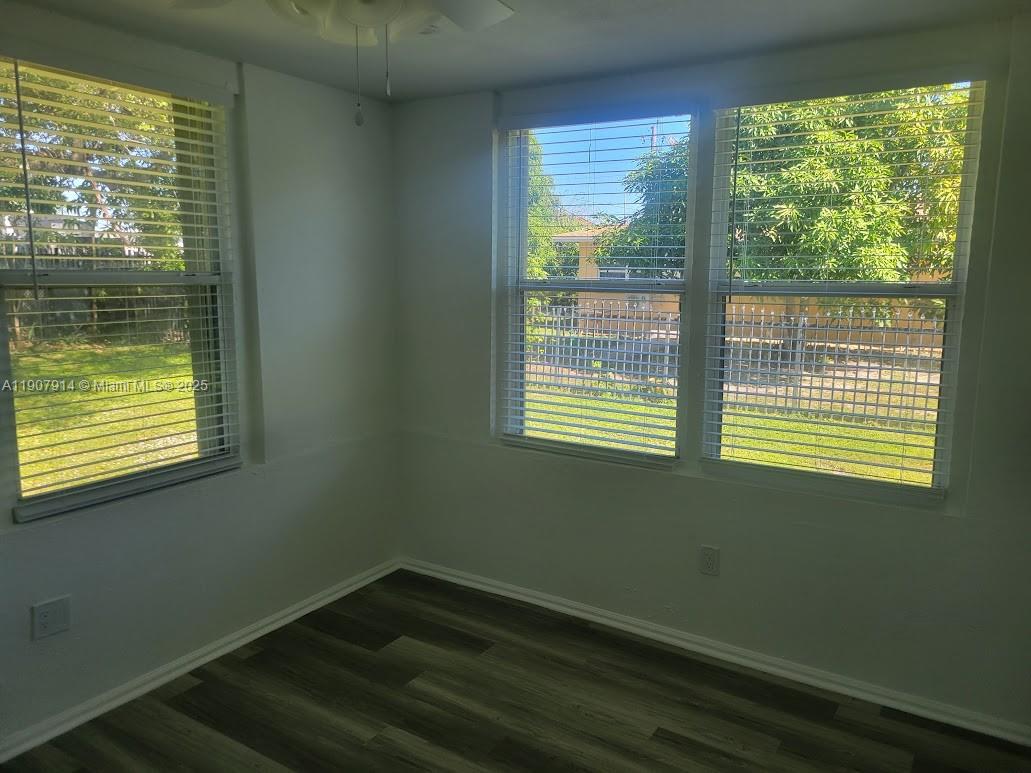 751 Northwest 96th Street Miami, FL 33150 - Photo 8 of 12 a view of a room that has a window in it