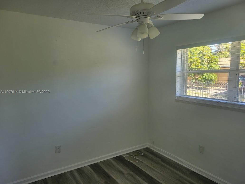751 Northwest 96th Street Miami, FL 33150 - Photo 9 of 12 an empty room with a window