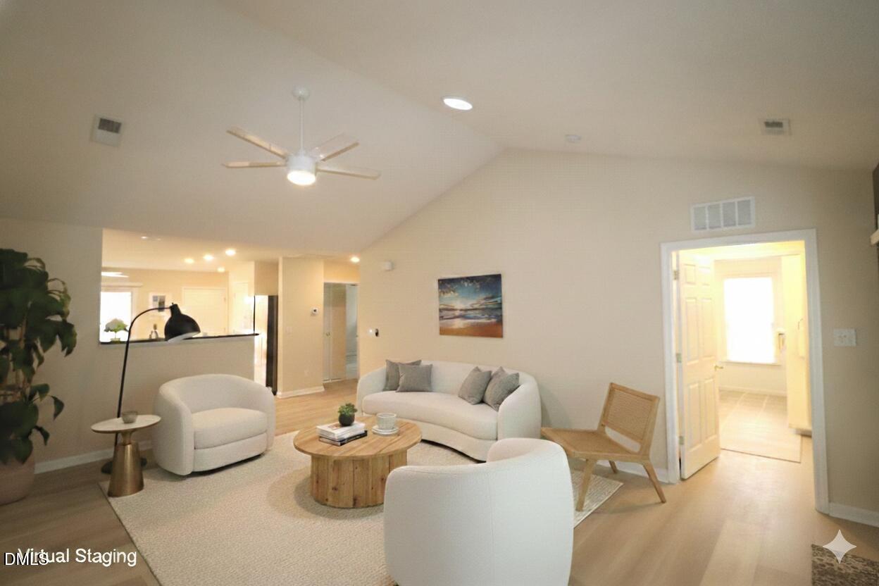 11230 Avocet Lane, Unit 102 Raleigh, NC 27617 - Photo 9 of 65 Living room looking toward kitchen