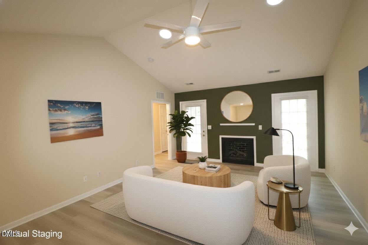 11230 Avocet Lane, Unit 102 Raleigh, NC 27617 - Photo 11 of 65 Living room toward fireplace