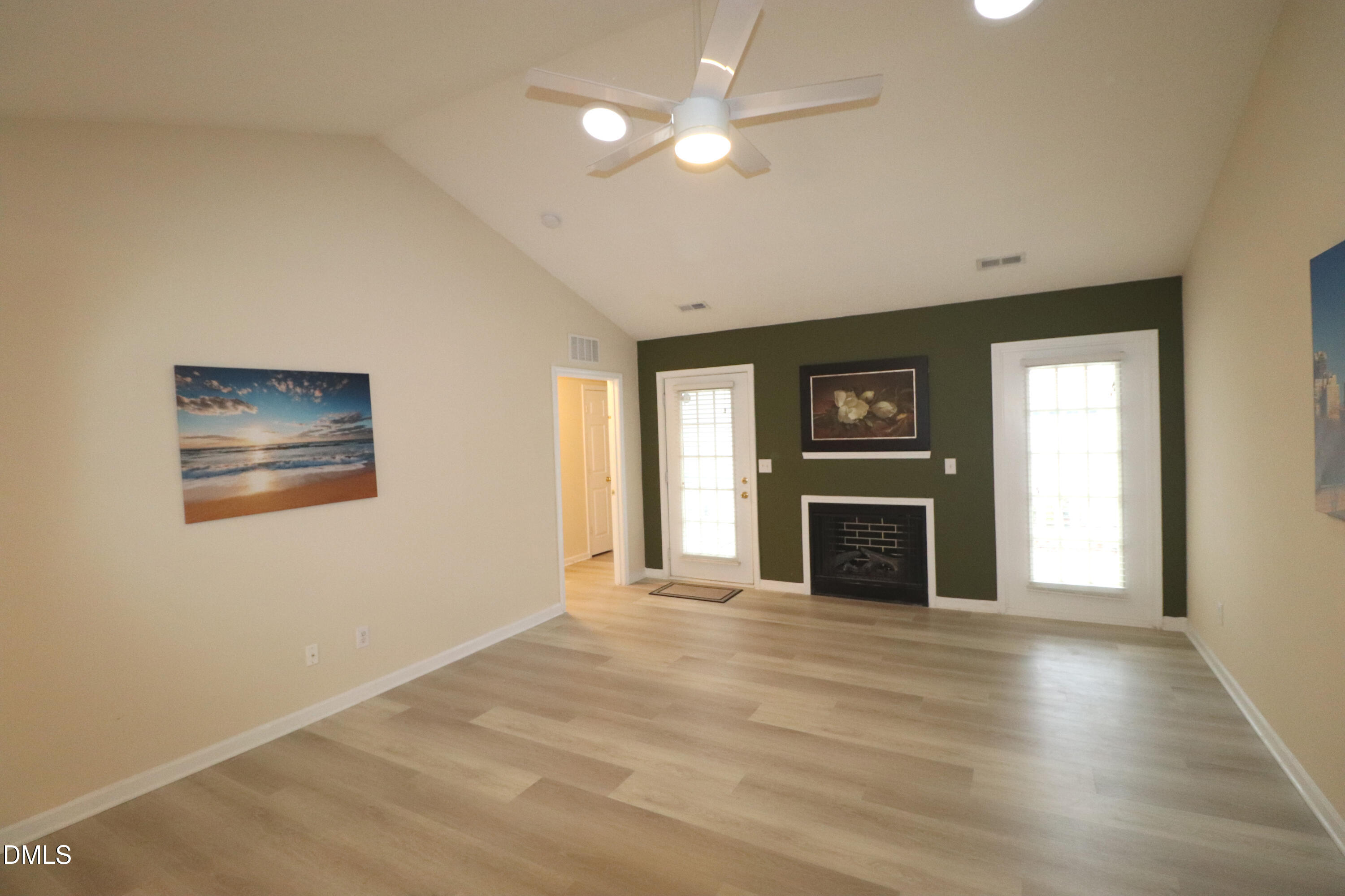 11230 Avocet Lane, Unit 102 Raleigh, NC 27617 - Photo 12 of 65 Living room front door and window