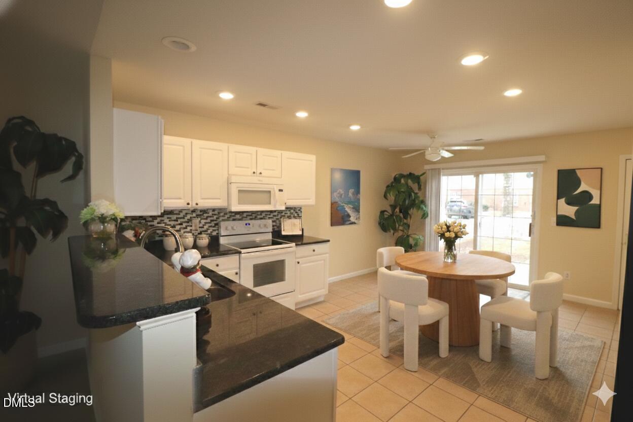 11230 Avocet Lane, Unit 102 Raleigh, NC 27617 - Photo 14 of 65 Kitchen and Dining Area
