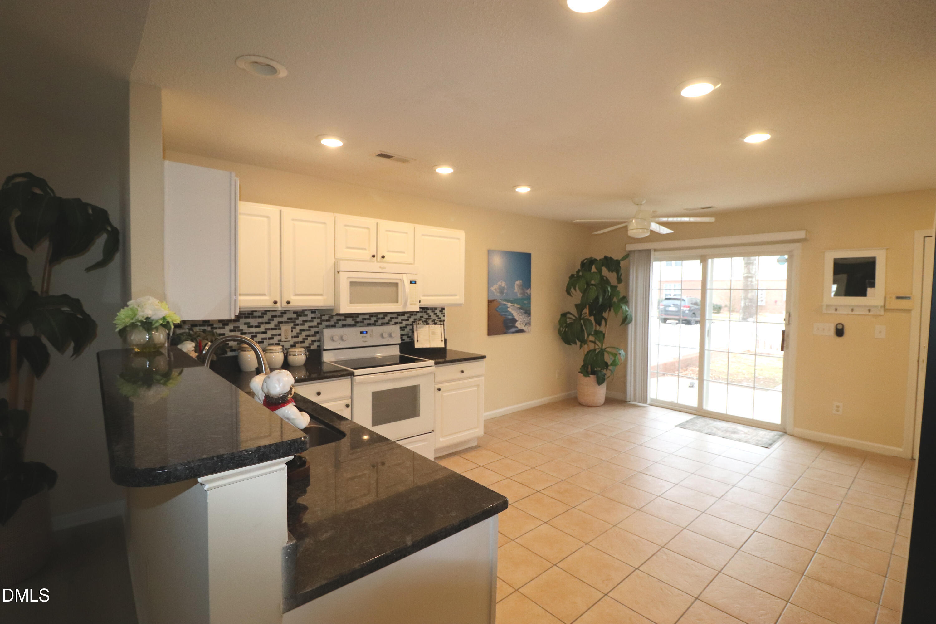 11230 Avocet Lane, Unit 102 Raleigh, NC 27617 - Photo 15 of 65 Glass Door provides light