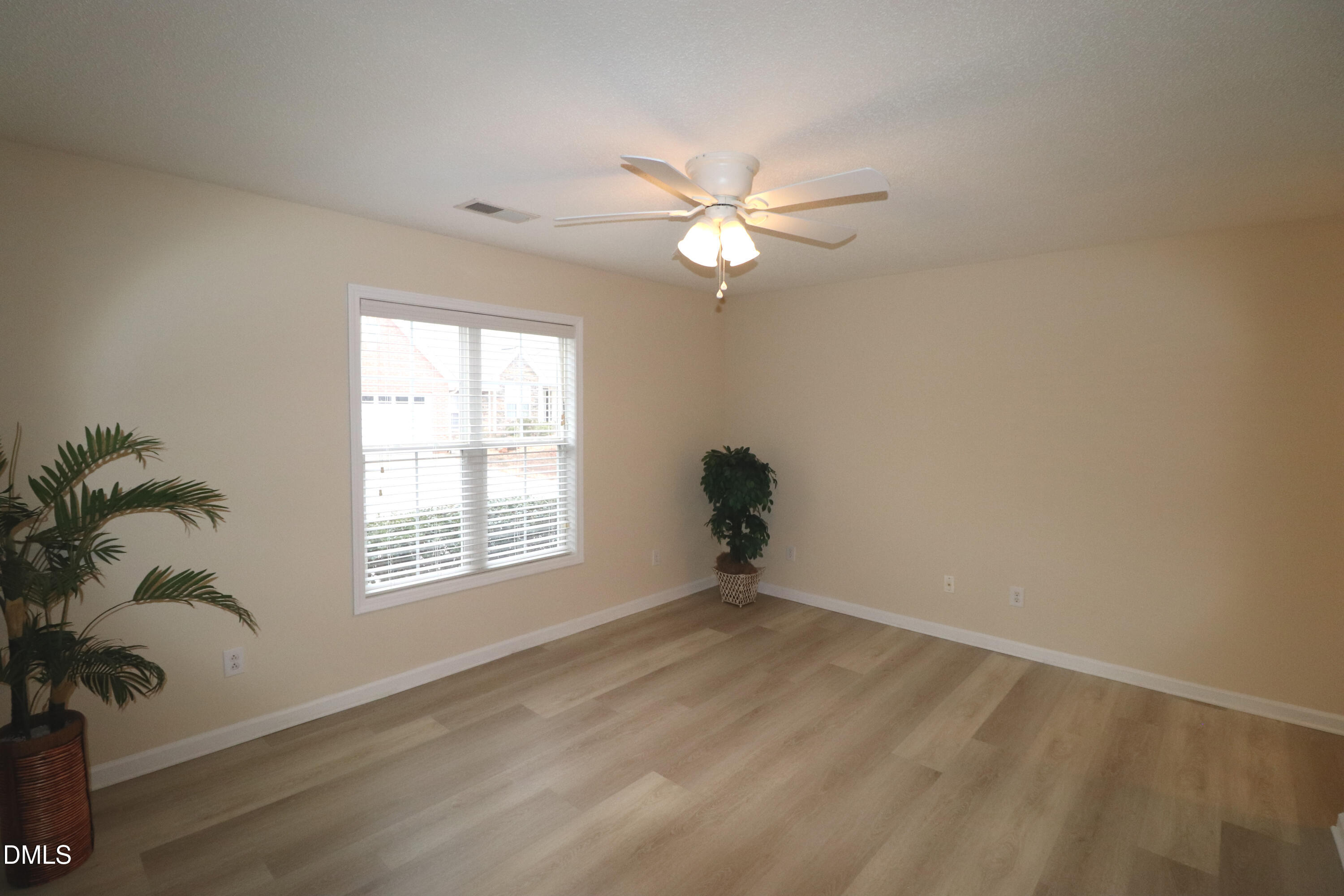 11230 Avocet Lane, Unit 102 Raleigh, NC 27617 - Photo 27 of 65 Primary Bedroom Luxury Vinyl Flooring