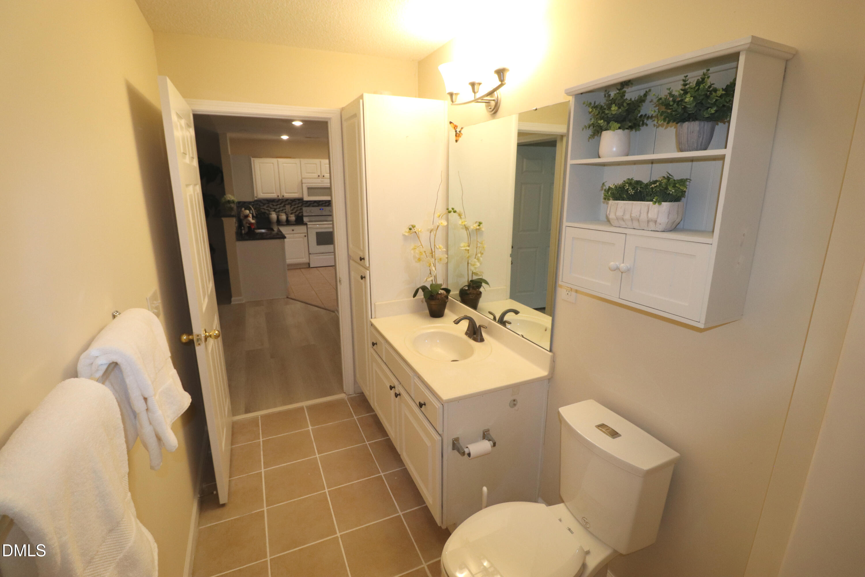 11230 Avocet Lane, Unit 102 Raleigh, NC 27617 - Photo 45 of 65 Hall Bath Tile Floor