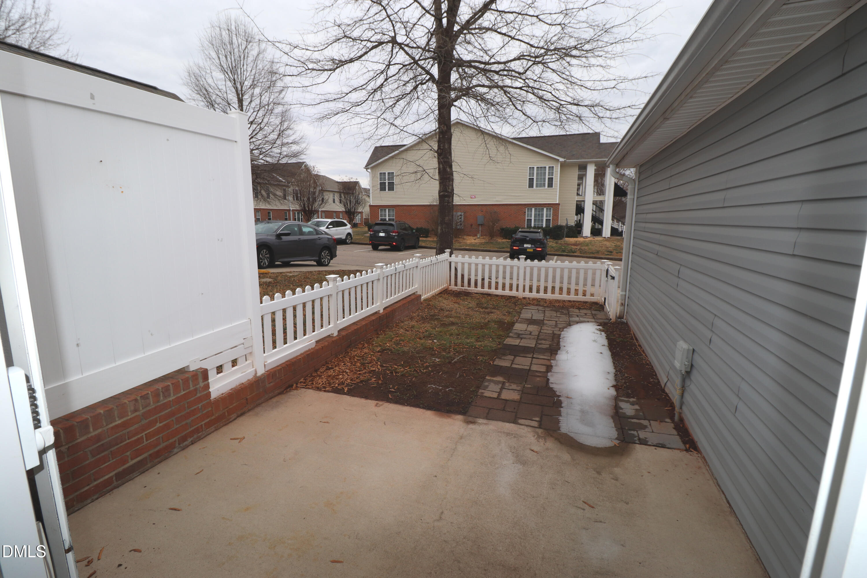 11230 Avocet Lane, Unit 102 Raleigh, NC 27617 - Photo 56 of 65 Back Patio with Privacy Wall