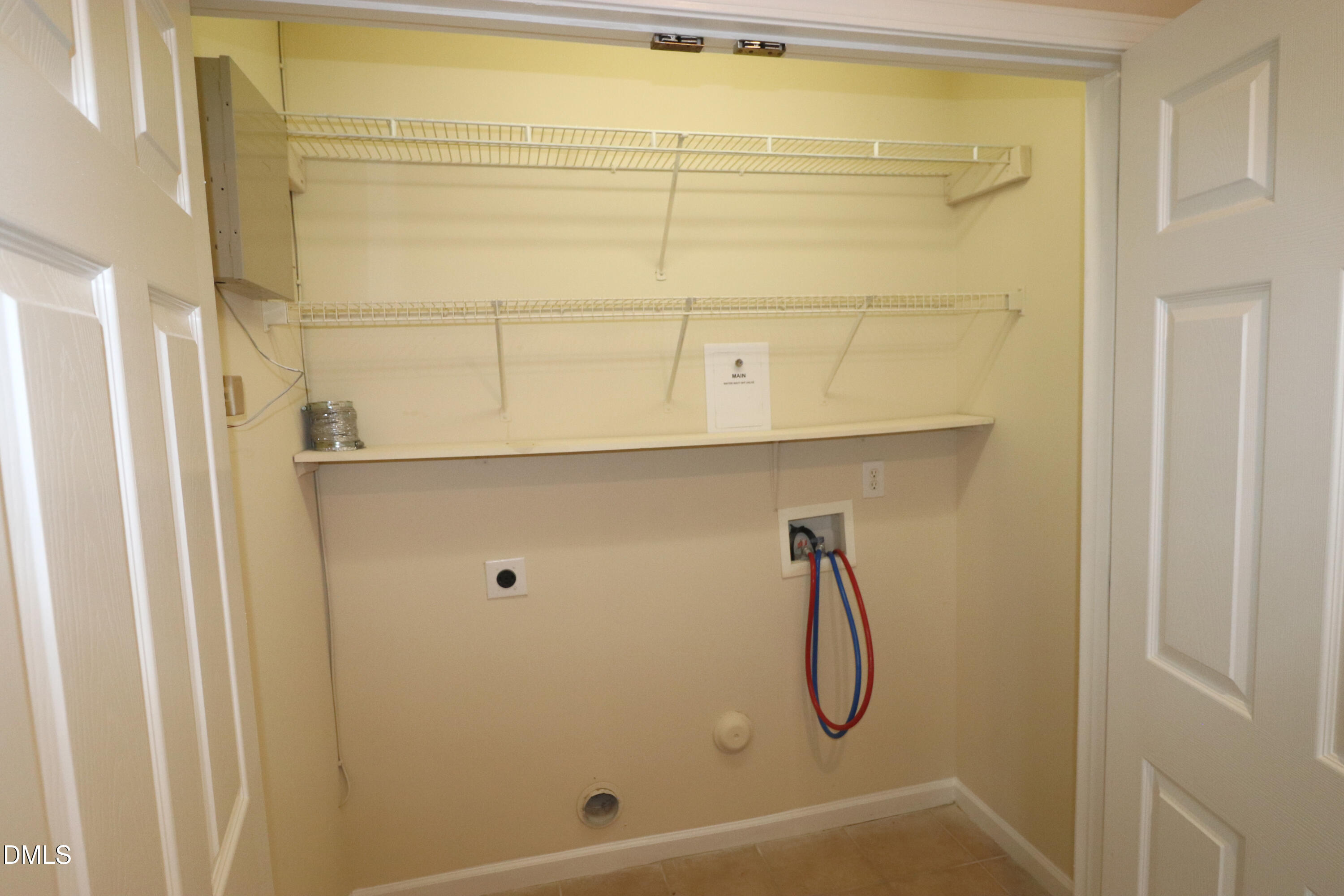 11230 Avocet Lane, Unit 102 Raleigh, NC 27617 - Photo 57 of 65 Laundry Room w. Shut Off Valve