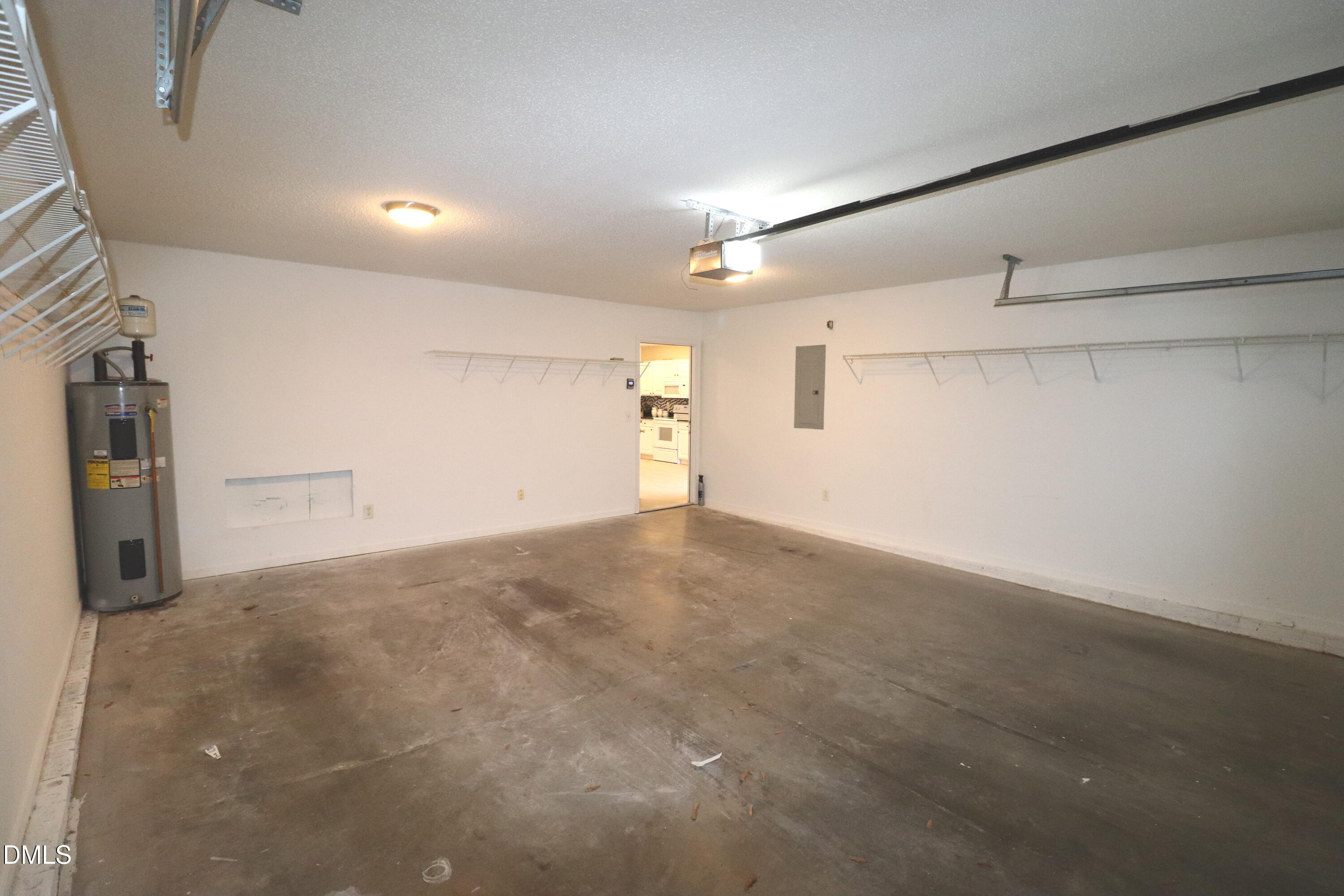 11230 Avocet Lane, Unit 102 Raleigh, NC 27617 - Photo 60 of 65 Water Heater in Garage