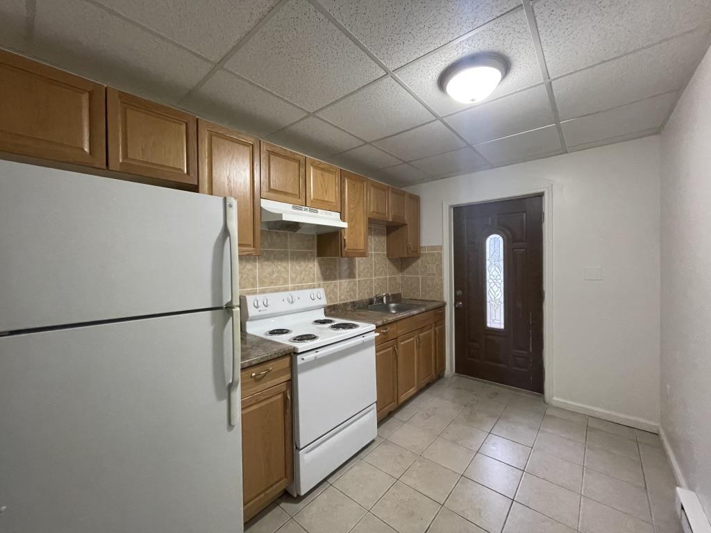 4429 Steuben Road, Unit 101 Bethlehem, PA 18020 - Photo 3 of 10 Functional kitchen with ample cabinetry and easy-to-maintain tile flooring.