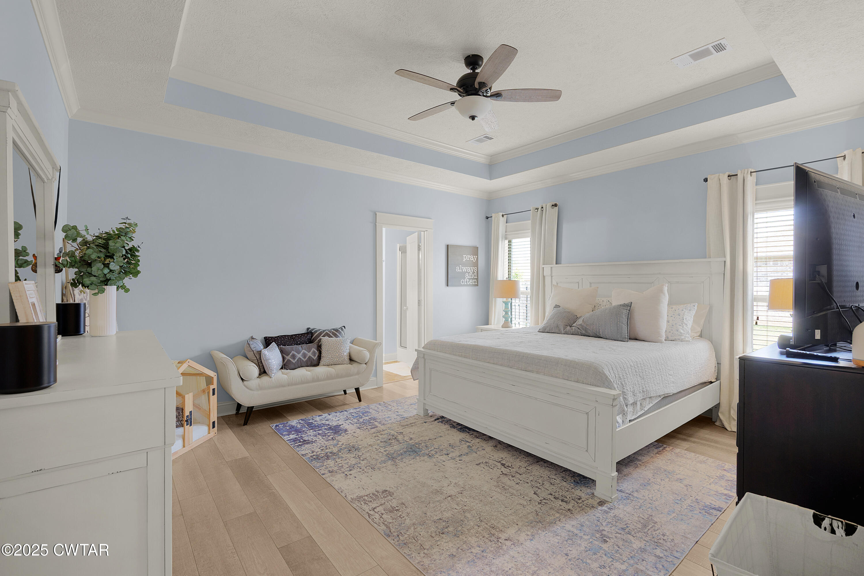 23 Shiloh Springs Jackson, TN 38305 - Photo 11 of 24 a spacious bedroom with a bed and a couch