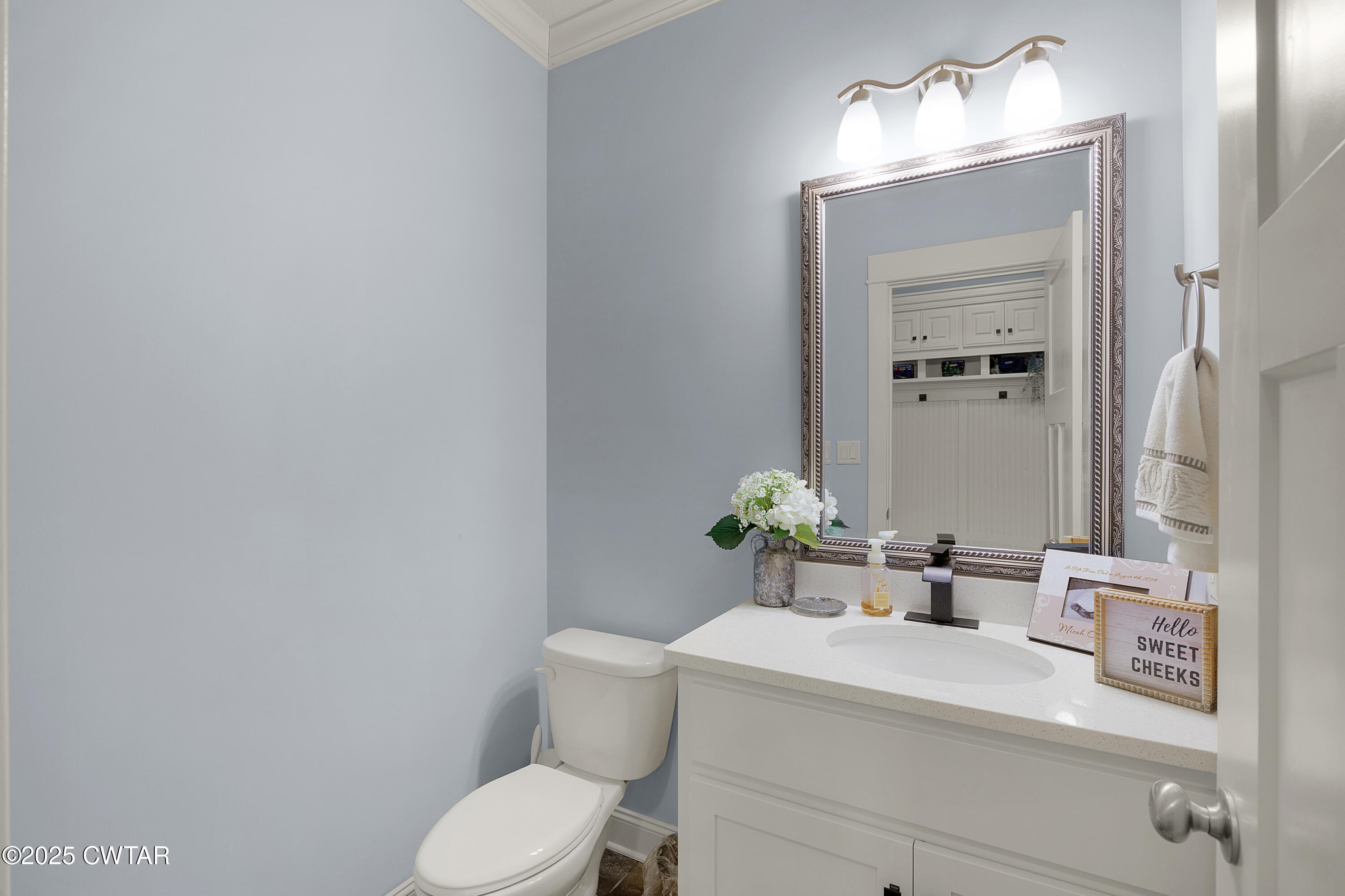 23 Shiloh Springs Jackson, TN 38305 - Photo 19 of 24 a bathroom with a toilet sink and mirror
