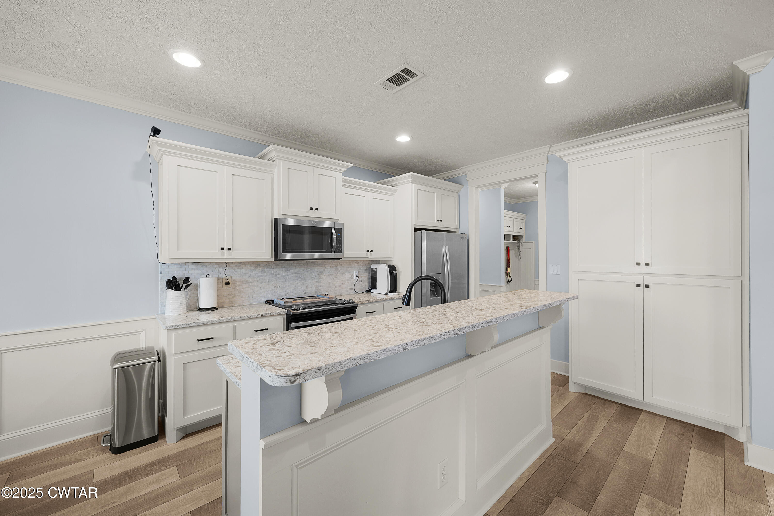 23 Shiloh Springs Jackson, TN 38305 - Photo 6 of 24 a kitchen with stainless steel appliances a refrigerator sink and microwave