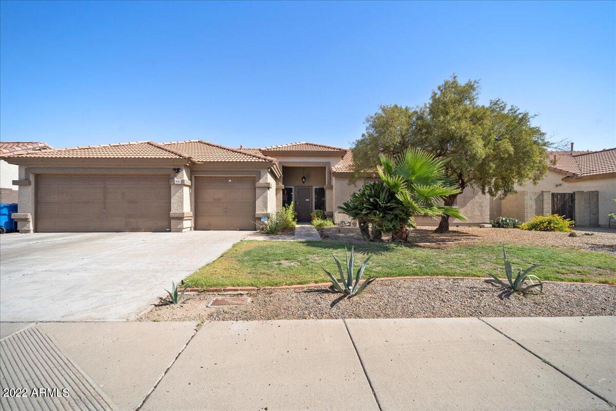1836 East Darrel Road Phoenix, AZ 85042 - Photo 3 of 28 front view of a house with a yard