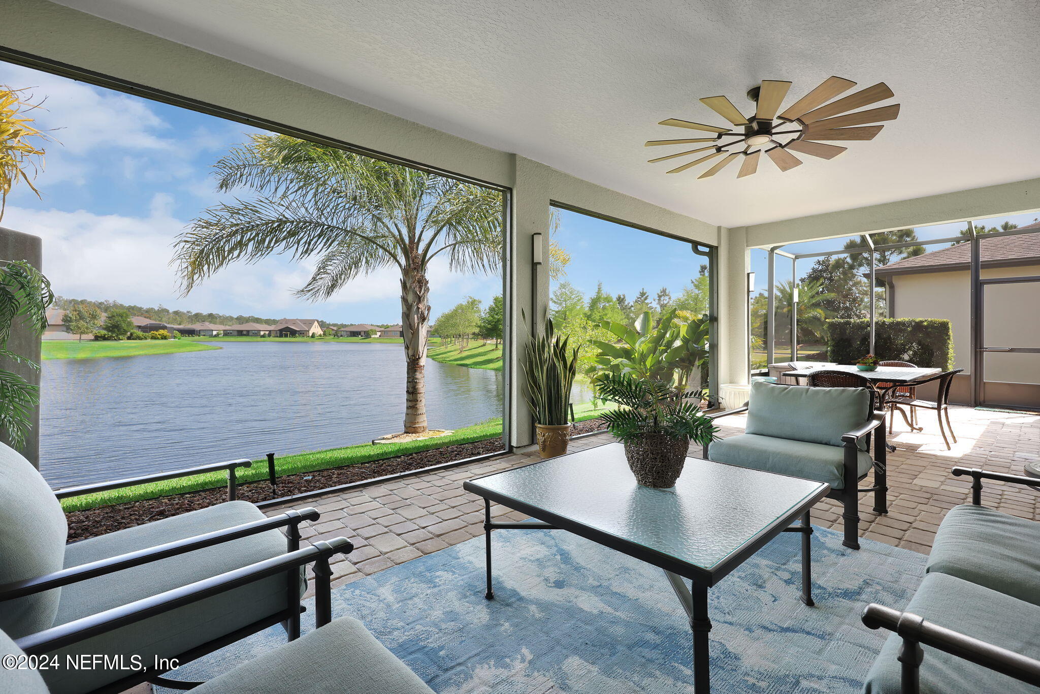 40 Tree Side Lane Ponte Vedra, FL 32081 - Photo 1 of 100 a living room with furniture and a potted plant