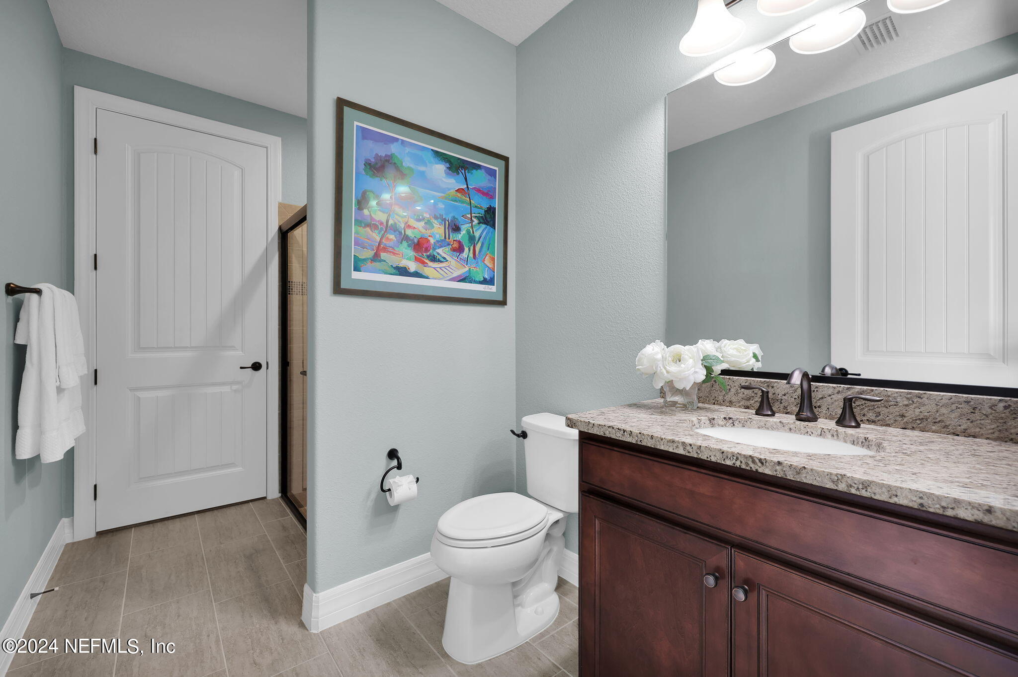 40 Tree Side Lane Ponte Vedra, FL 32081 - Photo 13 of 100 a bathroom with a granite countertop toilet sink and mirror
