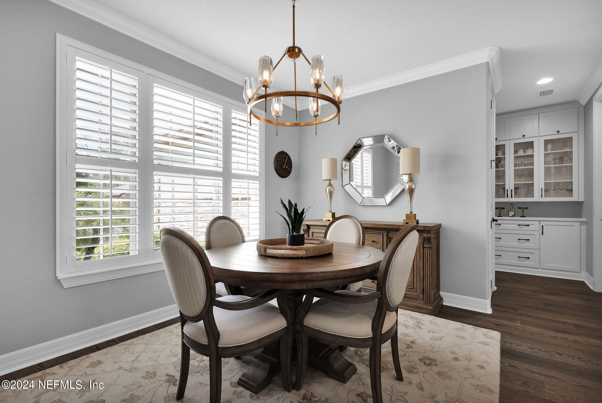 40 Tree Side Lane Ponte Vedra, FL 32081 - Photo 16 of 100 a view of a dining room with furniture window and wooden floor