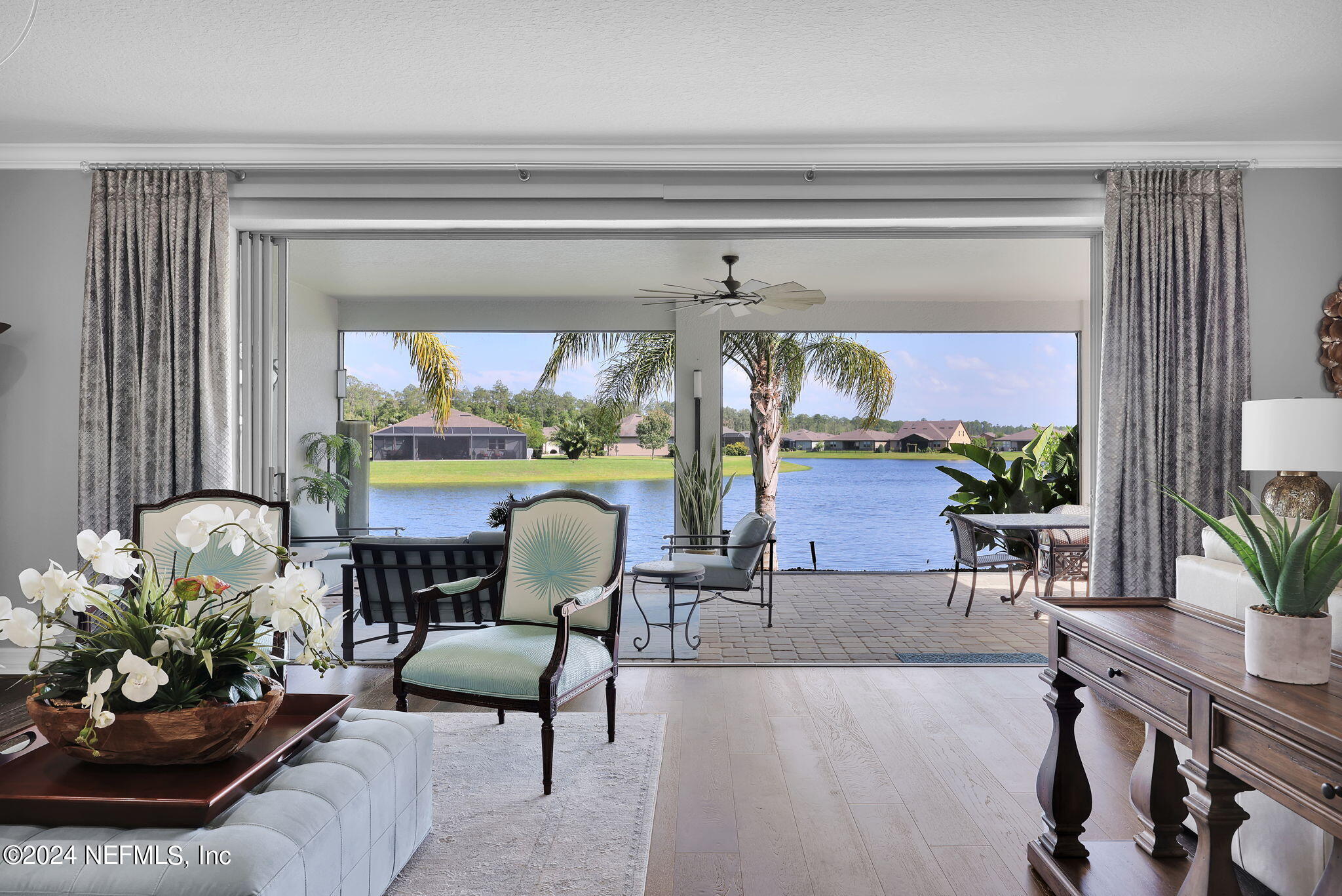 40 Tree Side Lane Ponte Vedra, FL 32081 - Photo 29 of 100 a living room with furniture and a potted plant