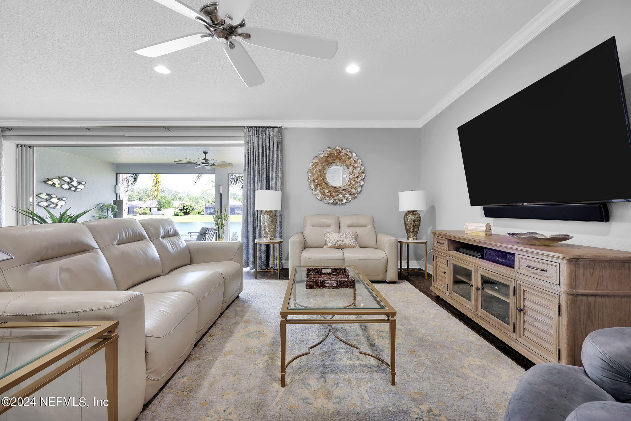 40 Tree Side Lane Ponte Vedra, FL 32081 - Photo 31 of 100 a living room with furniture and a flat screen tv
