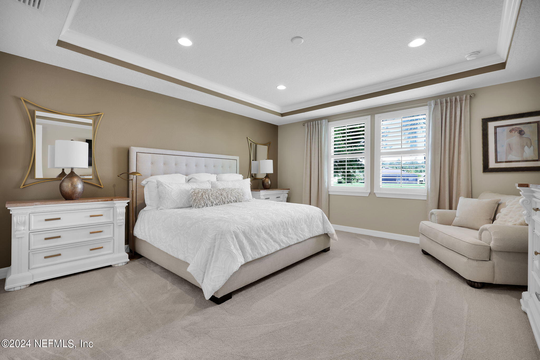 40 Tree Side Lane Ponte Vedra, FL 32081 - Photo 32 of 100 a spacious bedroom with a bed and a couch