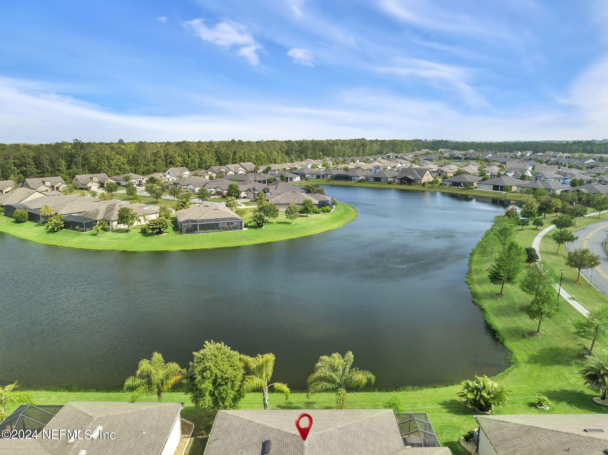 40 Tree Side Lane Ponte Vedra, FL 32081 - Photo 56 of 100 a view of a lake with a house