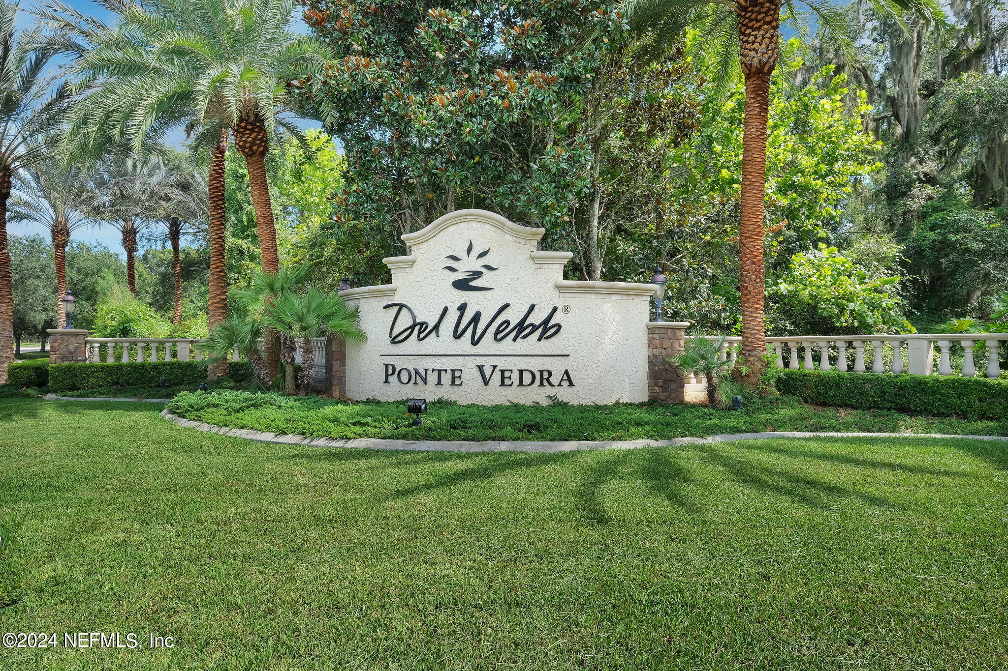 40 Tree Side Lane Ponte Vedra, FL 32081 - Photo 60 of 100 a sign of golf club on a wall under a tree