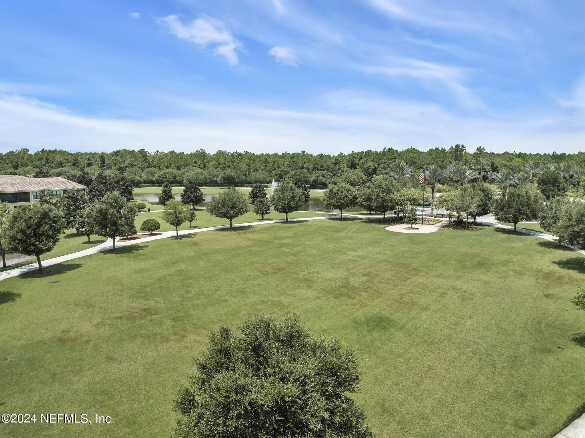 40 Tree Side Lane Ponte Vedra, FL 32081 - Photo 94 of 100 a view of a lake with houses in the back