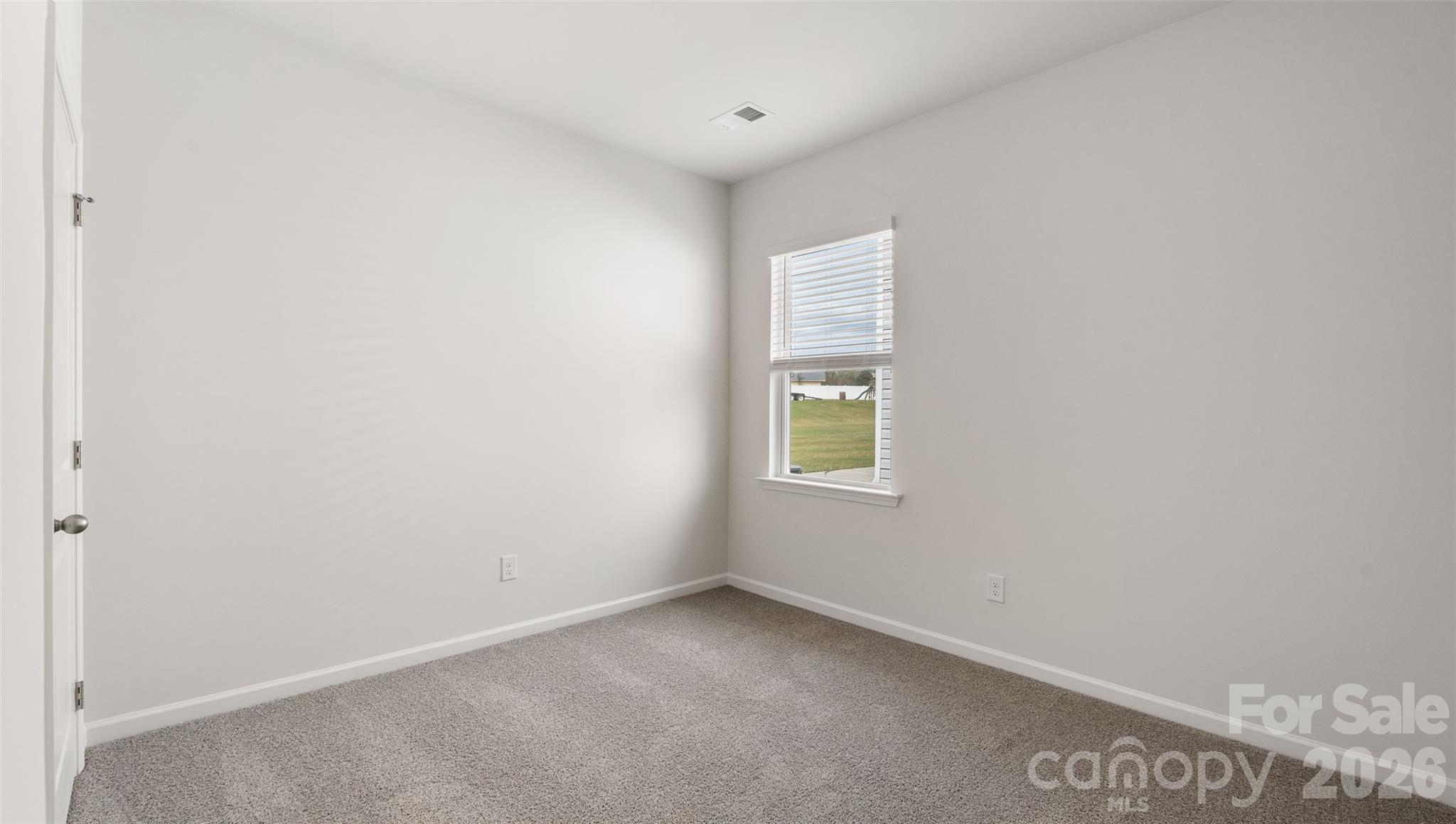 100 Piney Wds Road Fletcher, NC 28732 - Photo 17 of 33 a view of an empty room with a window