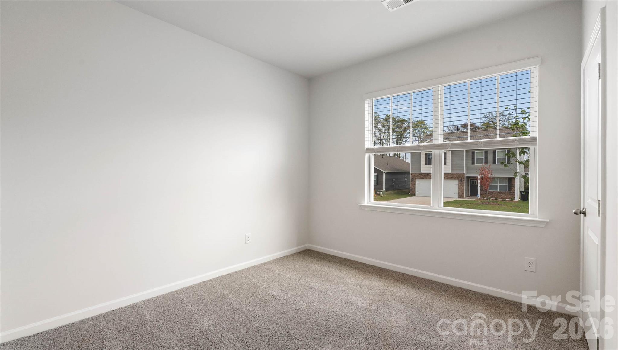 100 Piney Wds Road Fletcher, NC 28732 - Photo 18 of 33 a view of an empty room with a window