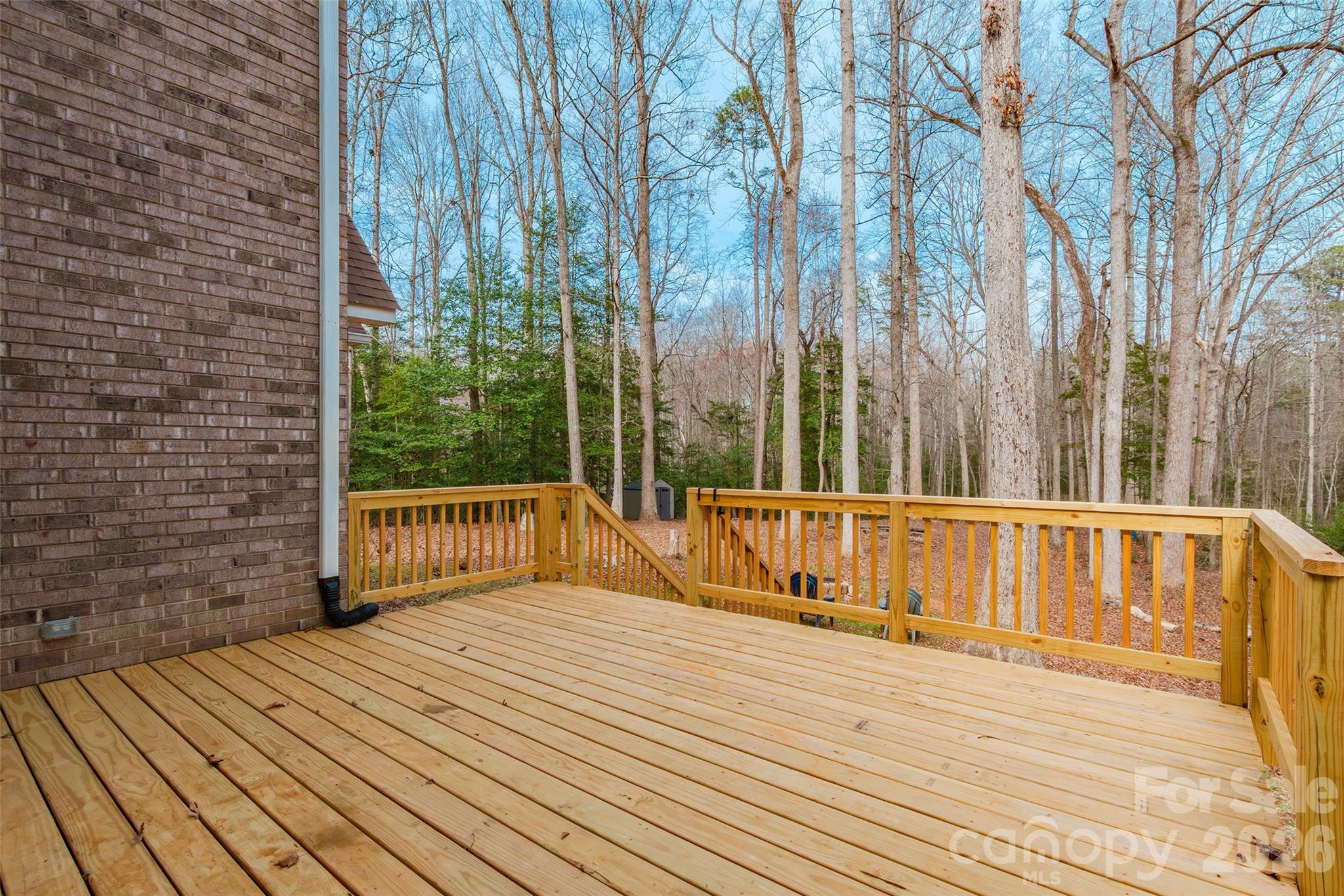 321 Forbes Court Clover, SC 29710 - Photo 23 of 31 a view of balcony with wooden floor and fence