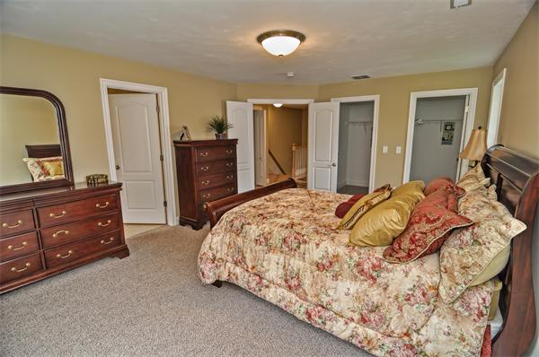 59 Partridge Hill Road Sutton, MA 01590 - Photo 11 of 16 a bedroom with a bed and a dresser