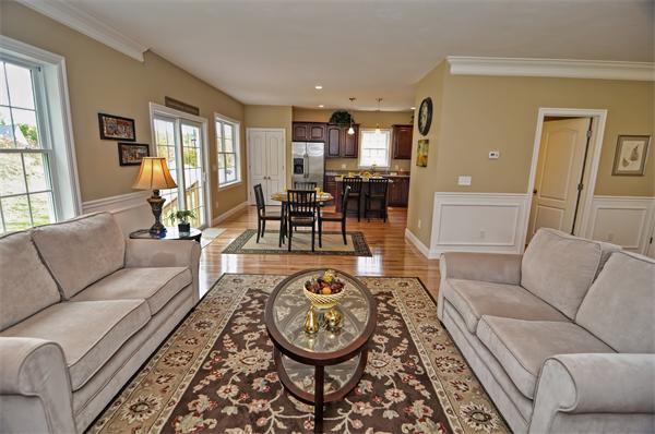 59 Partridge Hill Road Sutton, MA 01590 - Photo 6 of 16 a living room with furniture a dining table and chair with wooden floor