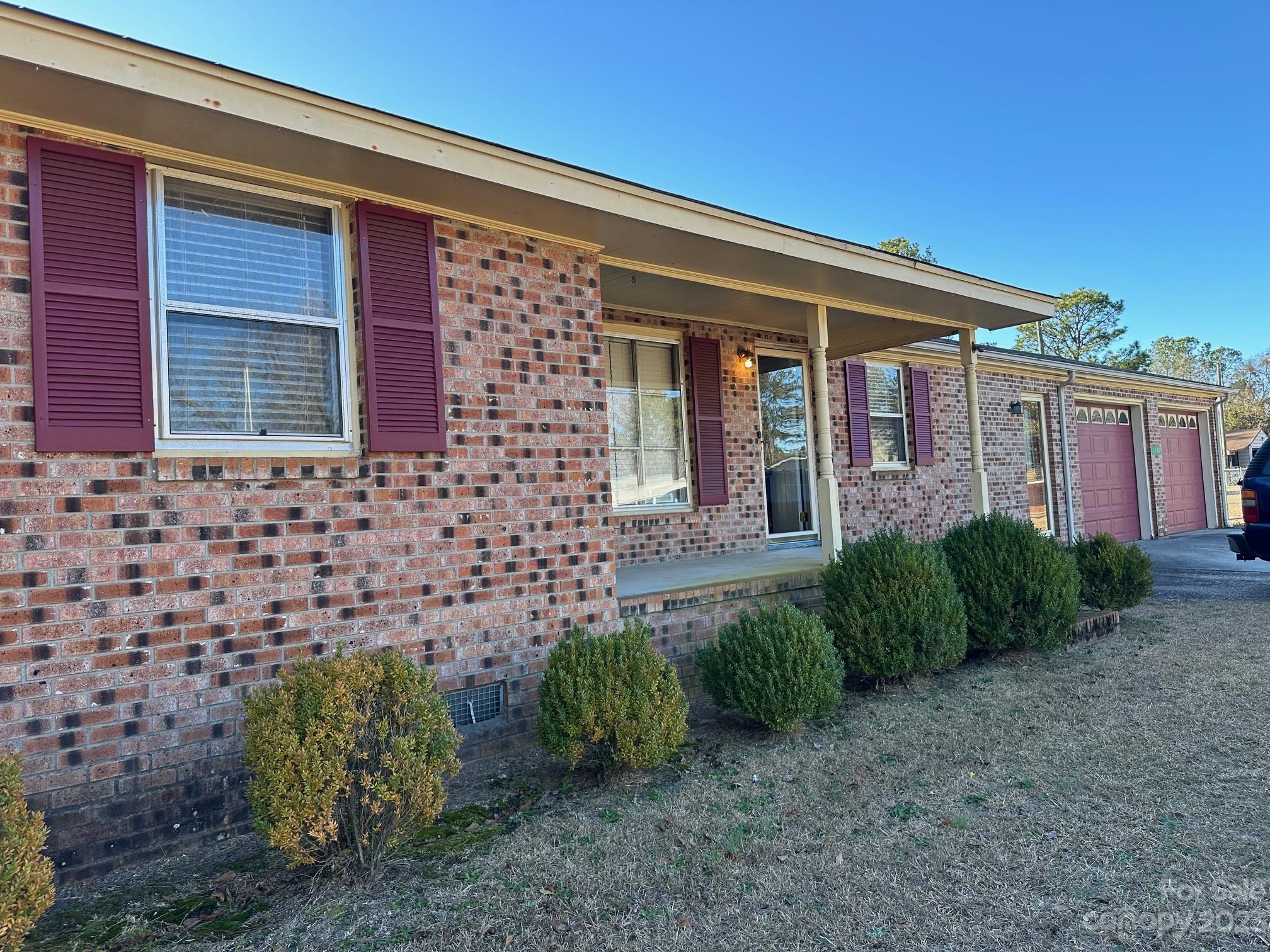1133 State Rd S-28-547 Cassatt, SC 29032 - Photo 23 of 24 a view of a brick house with a yard