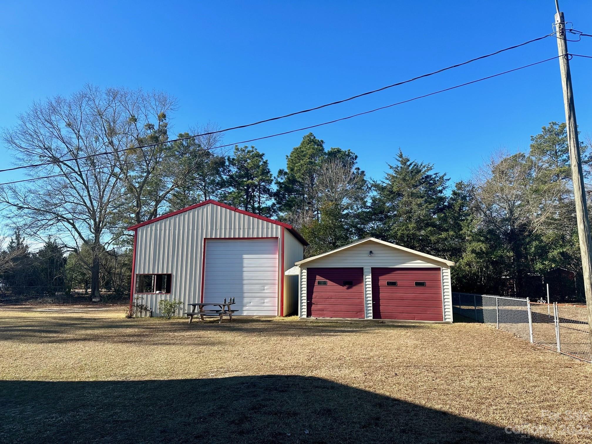 1133 State Rd S-28-547 Cassatt, SC 29032 - Photo 5 of 24 a front view of a house with a yard