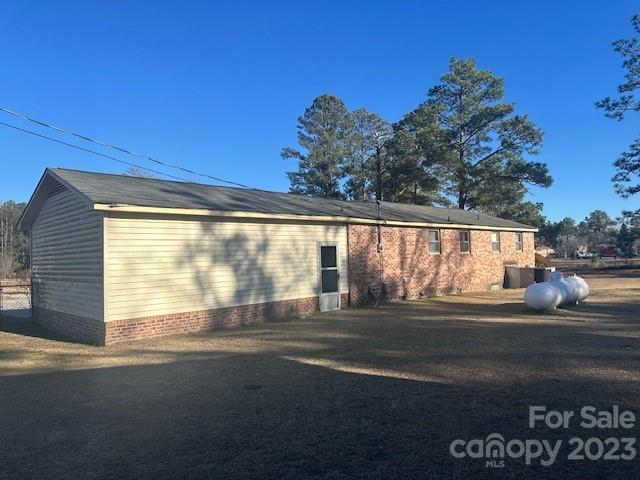 1133 State Rd S-28-547 Cassatt, SC 29032 - Photo 6 of 24 a view of a house with a street