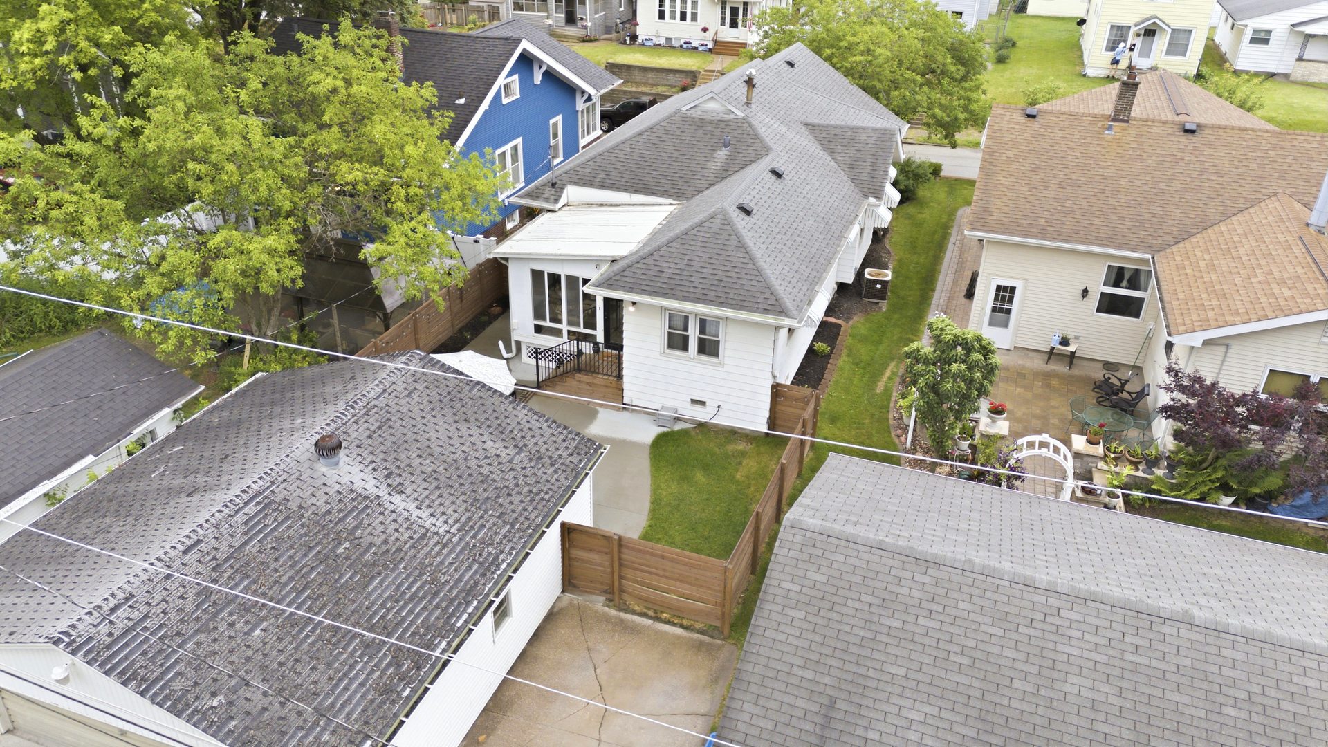2431 14th Avenue Moline, IL 61265 - Photo 28 of 37 an aerial view of a house with a yard and large tree