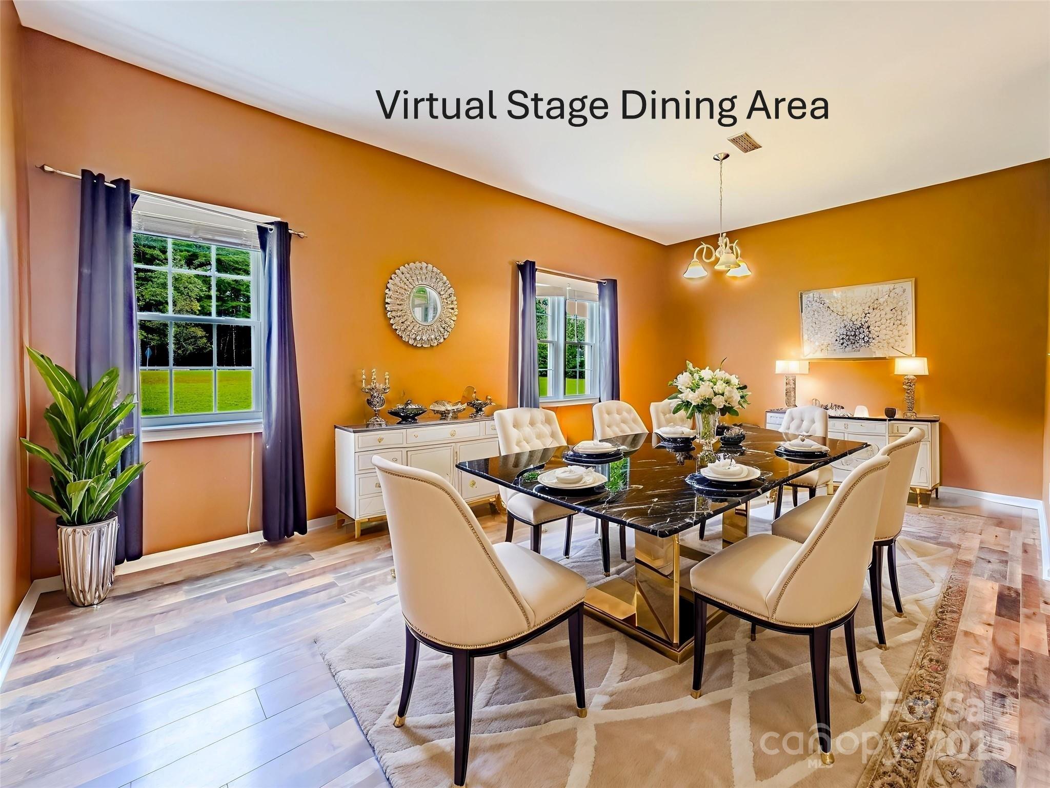 883 Pinehurst Road Ellenboro, NC 28040 - Photo 11 of 47 a view of a dining room with furniture and a potted plant