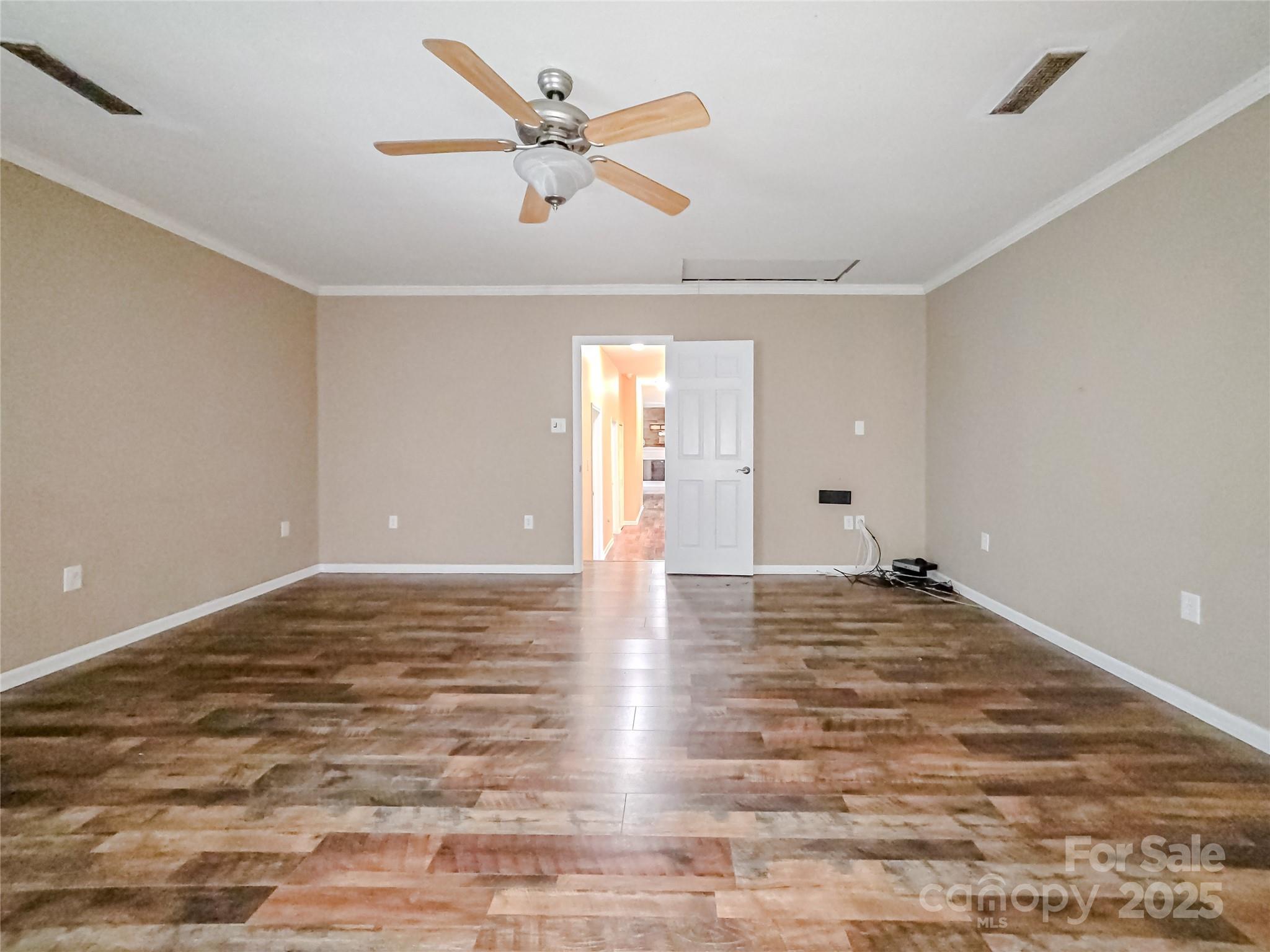 883 Pinehurst Road Ellenboro, NC 28040 - Photo 14 of 47 a view of empty room with wooden floor