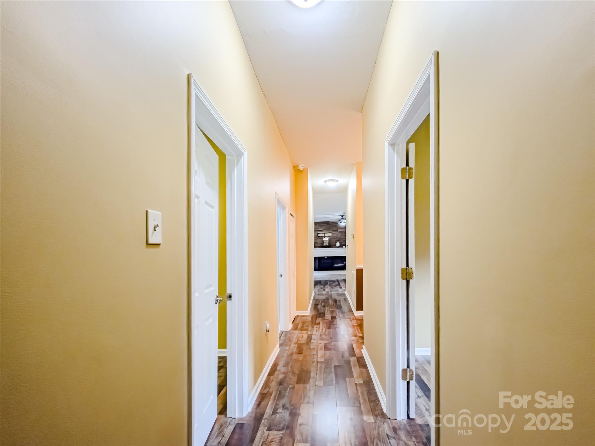 883 Pinehurst Road Ellenboro, NC 28040 - Photo 18 of 47 a view of a hallway with wooden floor and staircase