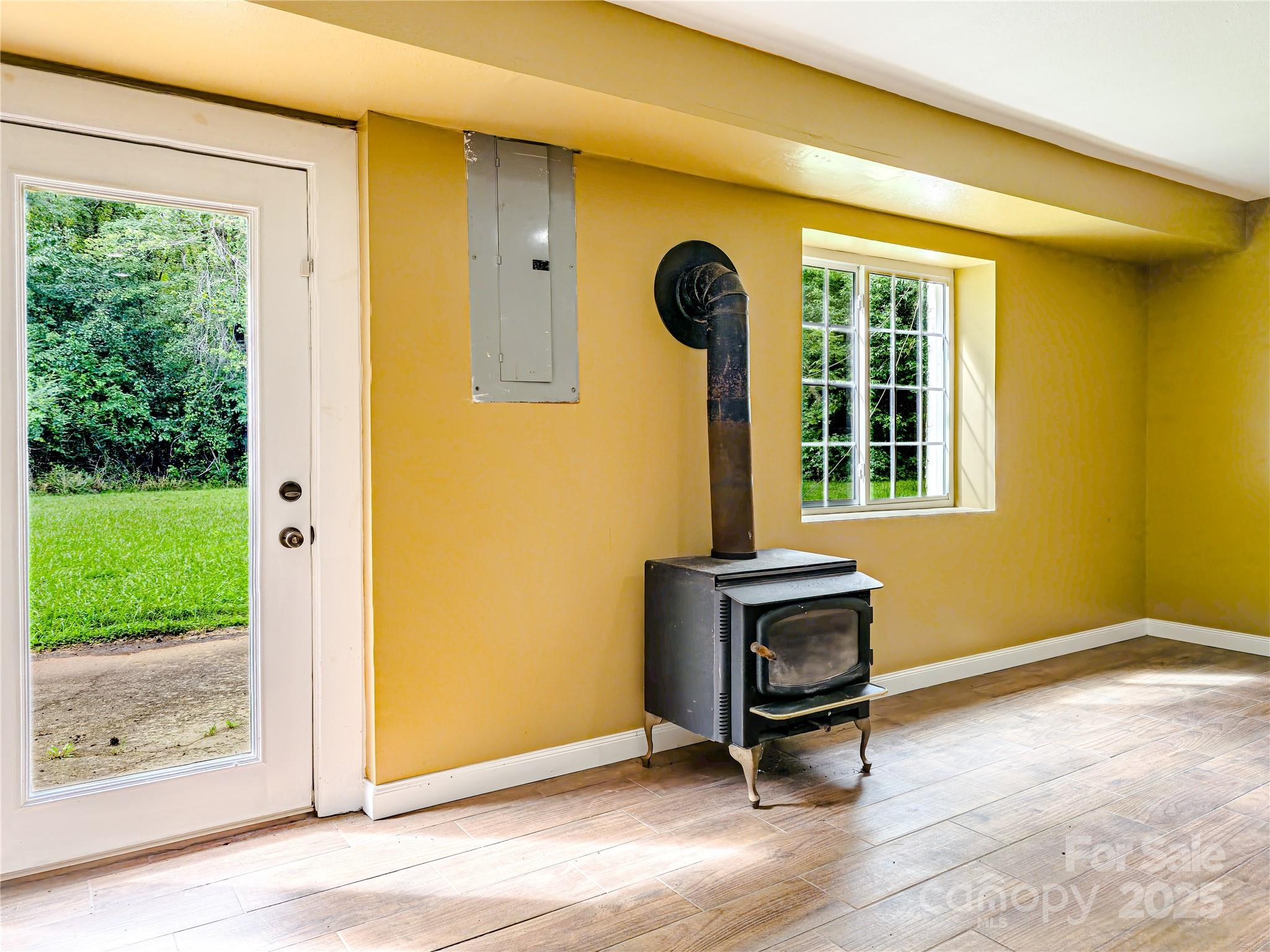 883 Pinehurst Road Ellenboro, NC 28040 - Photo 29 of 47 a view of a room with a window and wooden floor