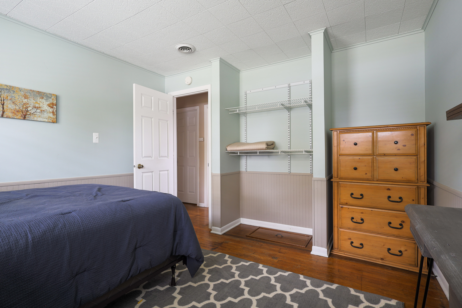 9425 Pine Street Mokena, IL 60448 - Photo 15 of 28 a bedroom with a bed and a cabinets