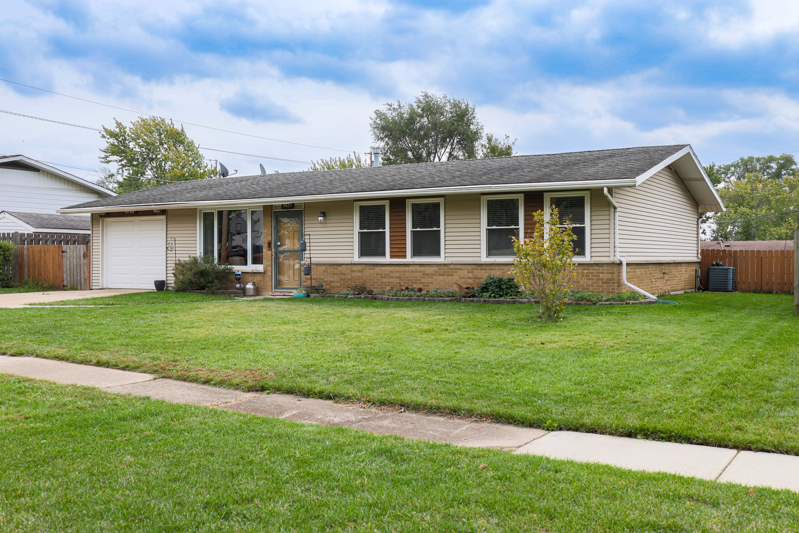 9425 Pine Street Mokena, IL 60448 - Photo 2 of 28 a front view of house with yard and green space