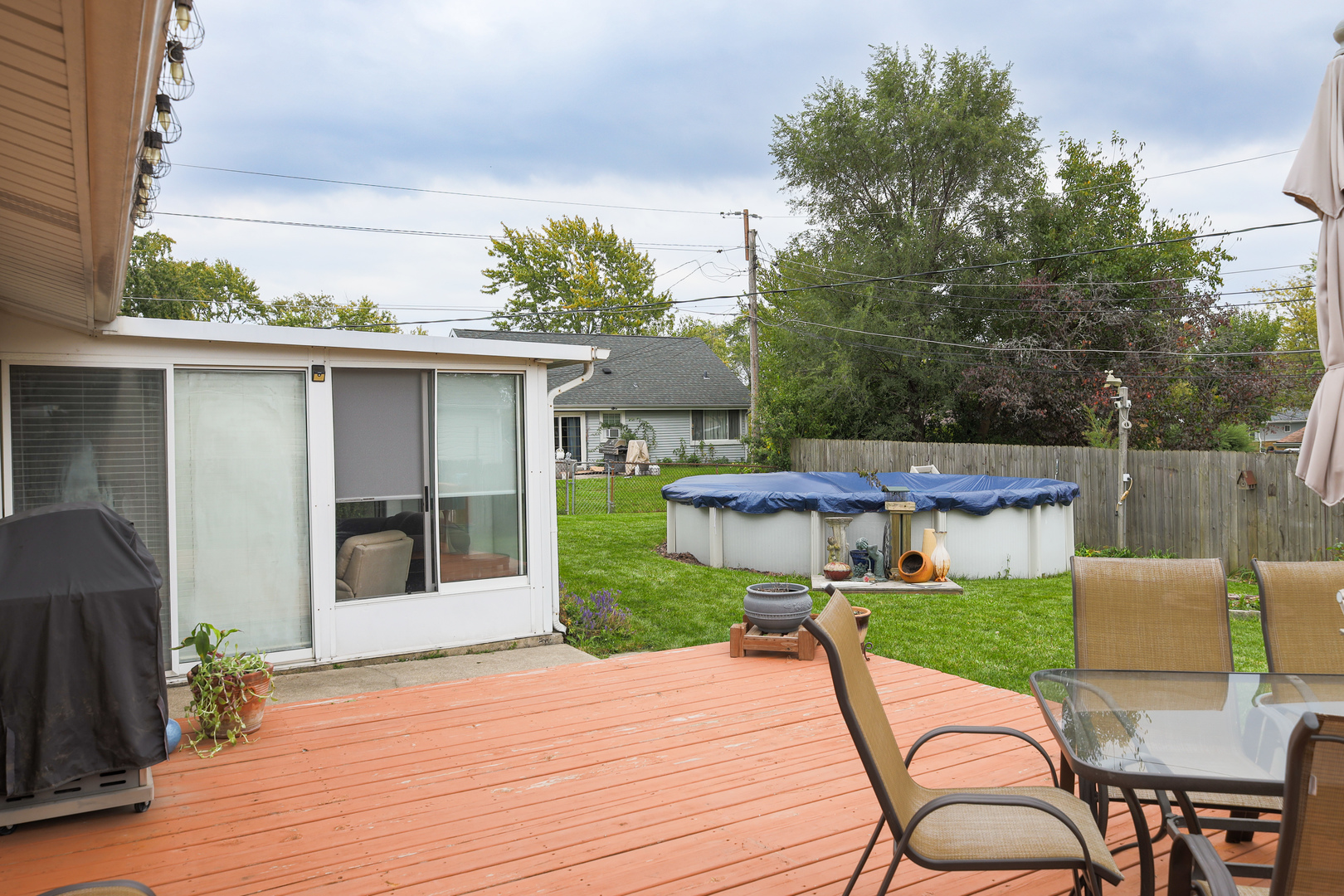 9425 Pine Street Mokena, IL 60448 - Photo 25 of 28 a view of a house with pool and chairs