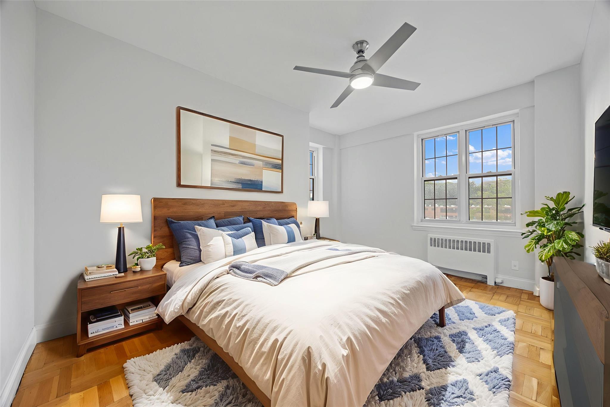 210 Pelham Road, Unit 2P New Rochelle, NY 10805 - Photo 1 of 1 Bedroom with radiator heating unit and a ceiling fan