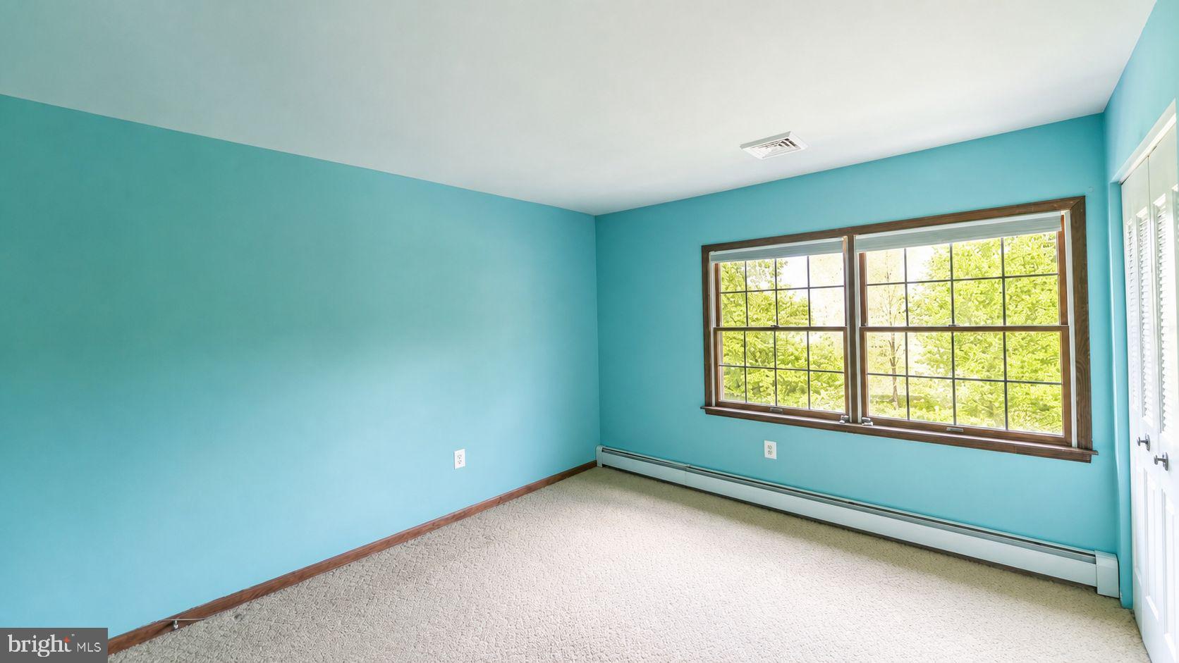 223 Trythall Road Elverson, PA 19520 - Photo 48 of 78 a view of an empty room with a window