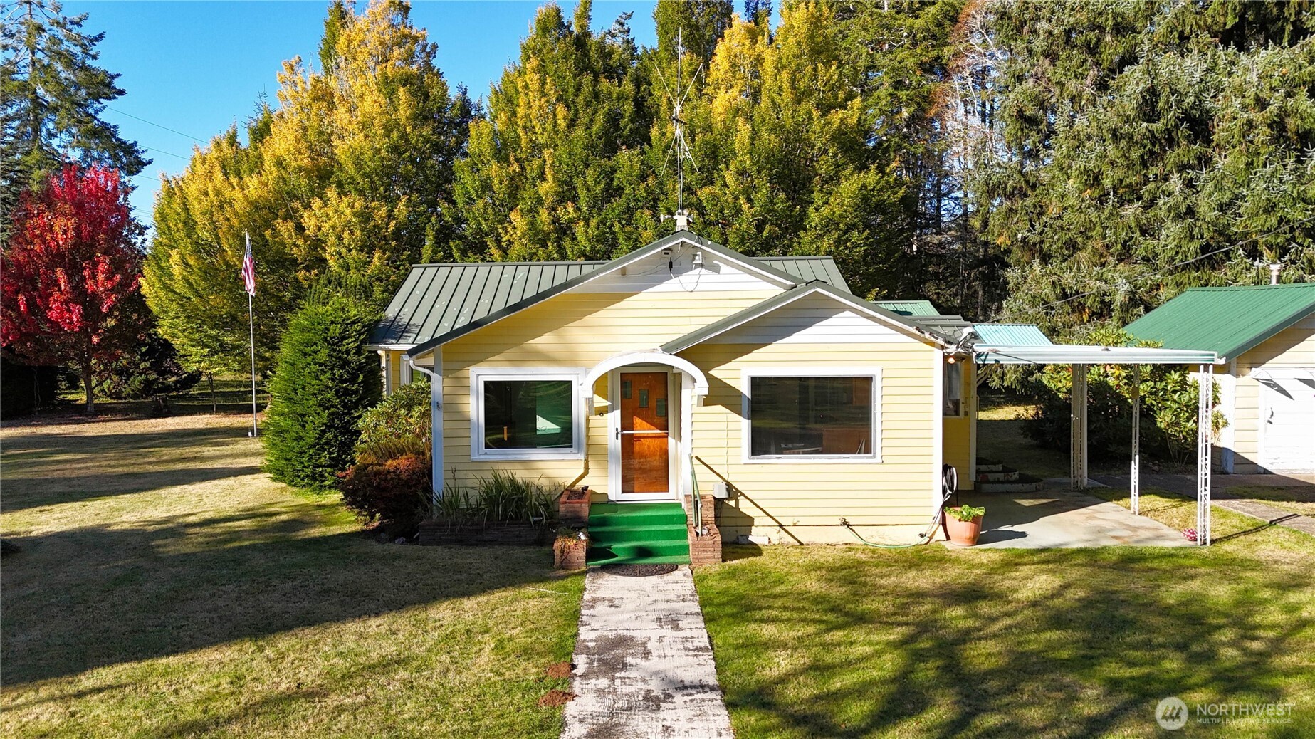 2030 Ocean Beach Road Copalis Crossing, WA 98536 - Photo 1 of 38 a view of a house with backyard and sitting area