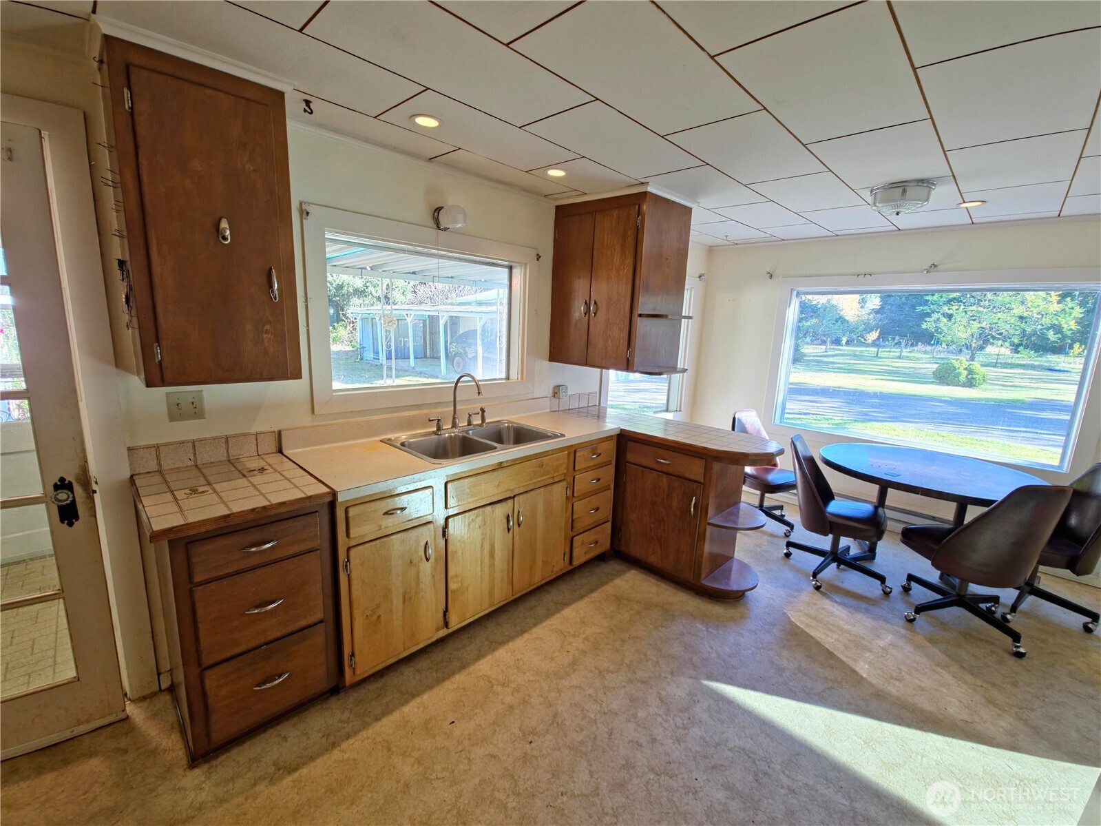 2030 Ocean Beach Road Copalis Crossing, WA 98536 - Photo 22 of 38 a kitchen that has a sink and chair