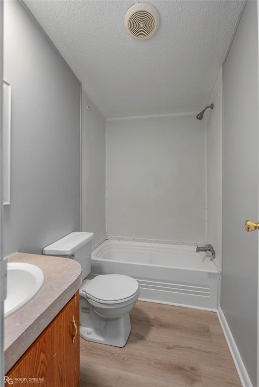 121 Kim Circle Stonewall, LA 71078 - Photo 30 of 33 a bathroom with a sink a toilet and shower