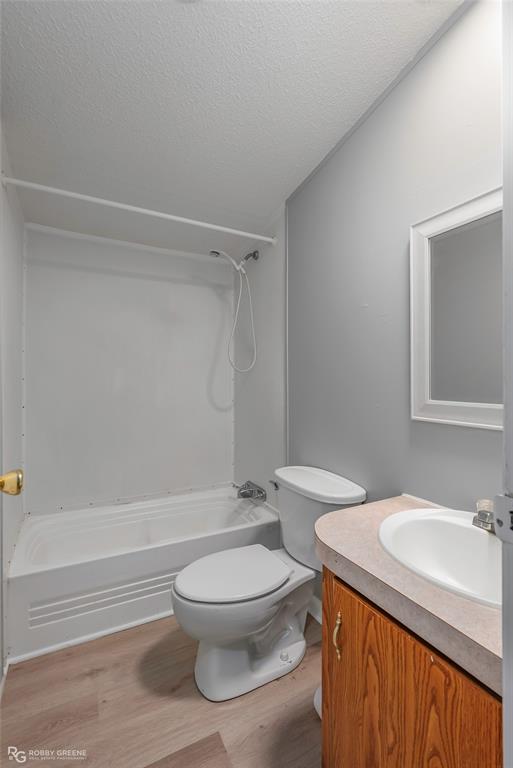 121 Kim Circle Stonewall, LA 71078 - Photo 31 of 33 a bathroom with a sink a toilet and shower