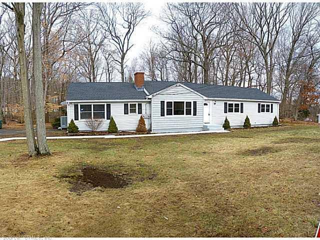 81 Bear Path Road Hamden, CT 06514 - Photo 1 of 1 a front view of a house with a yard